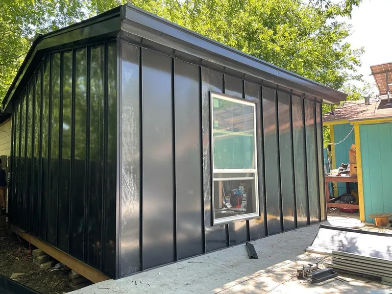 Black standing seam metal wall panels for Roof Inspection in Derry