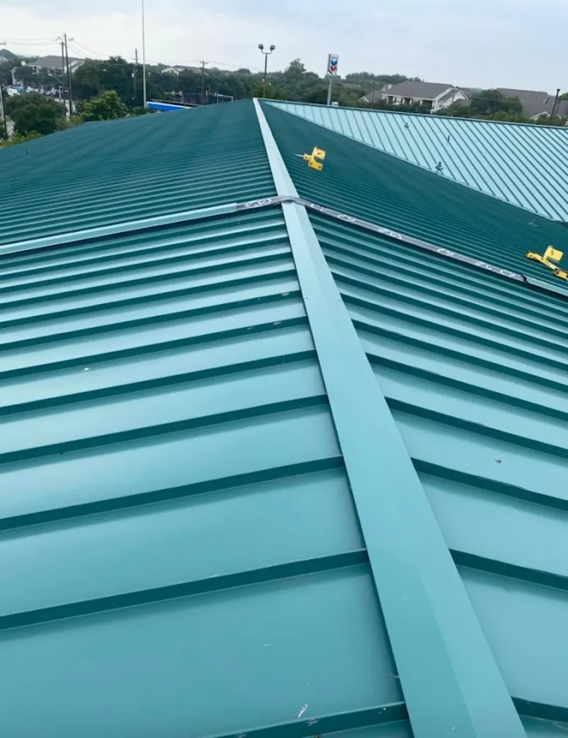 Green commercial metal roof ridge and valley for Metal Roof Repair in Derry